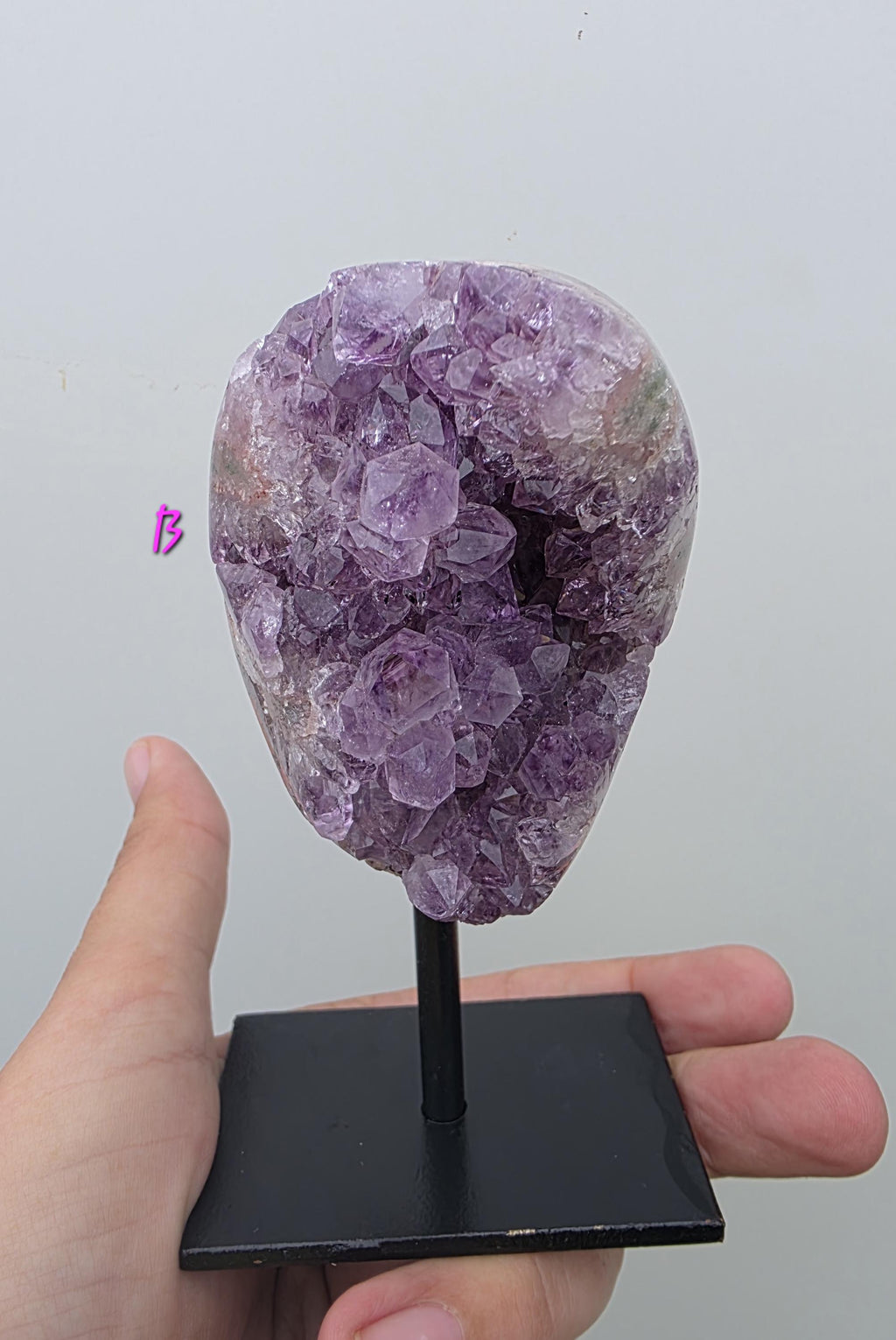 Natural Brazilian Amethyst on permanent stand