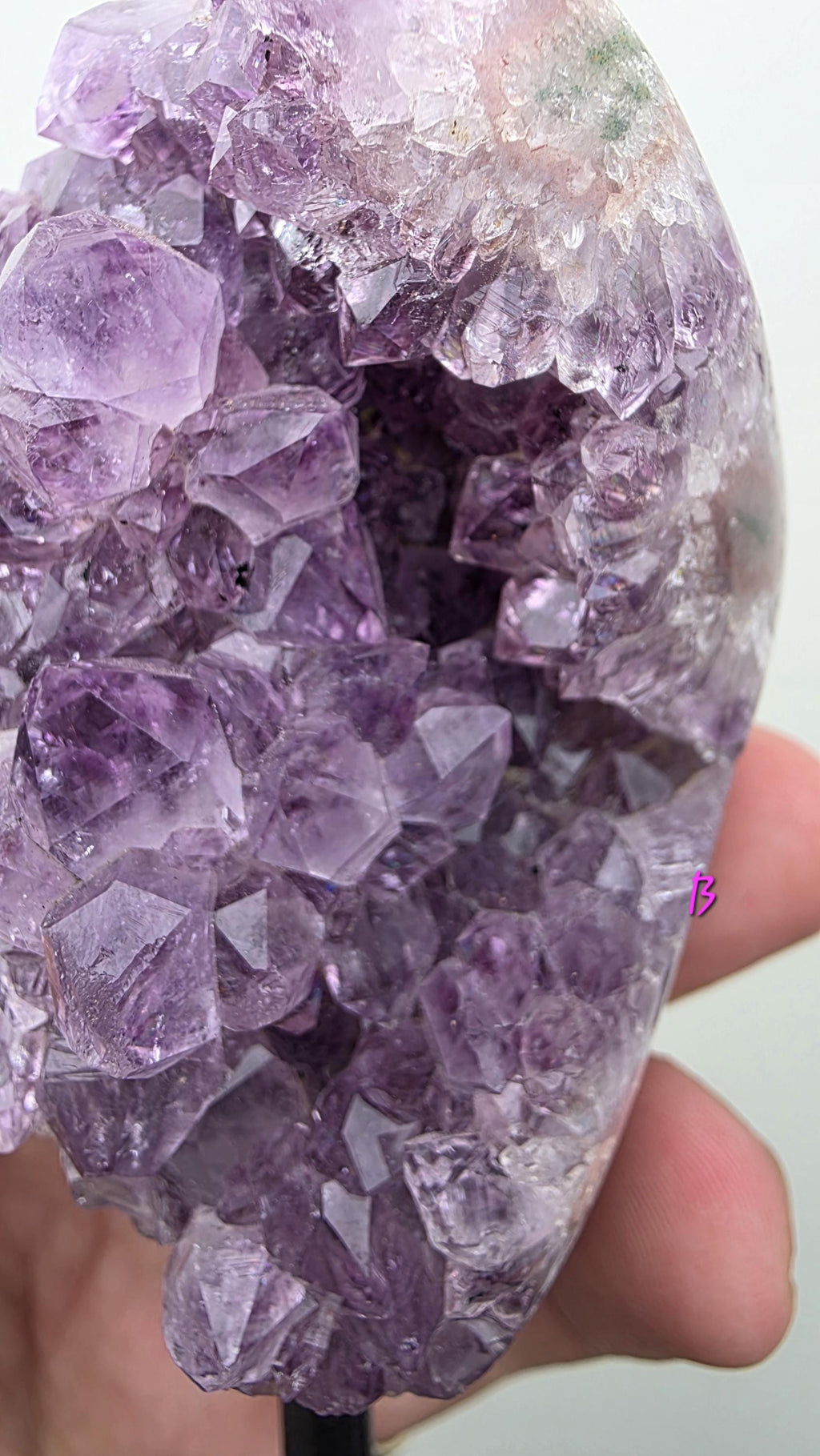 Natural Brazilian Amethyst on permanent stand