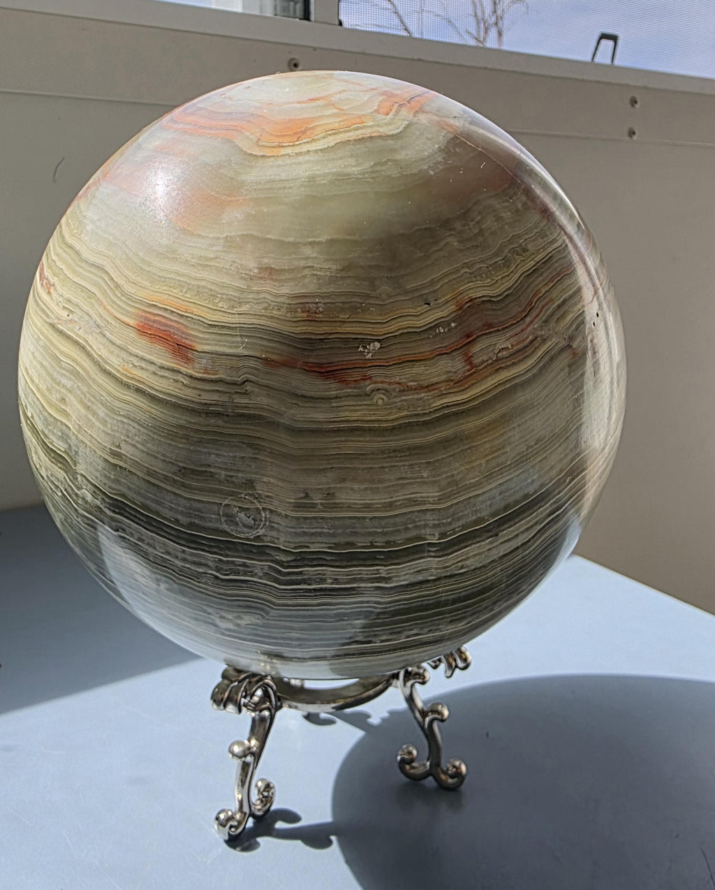 Extra large Banded calcite sphere ~ 5.08kgs