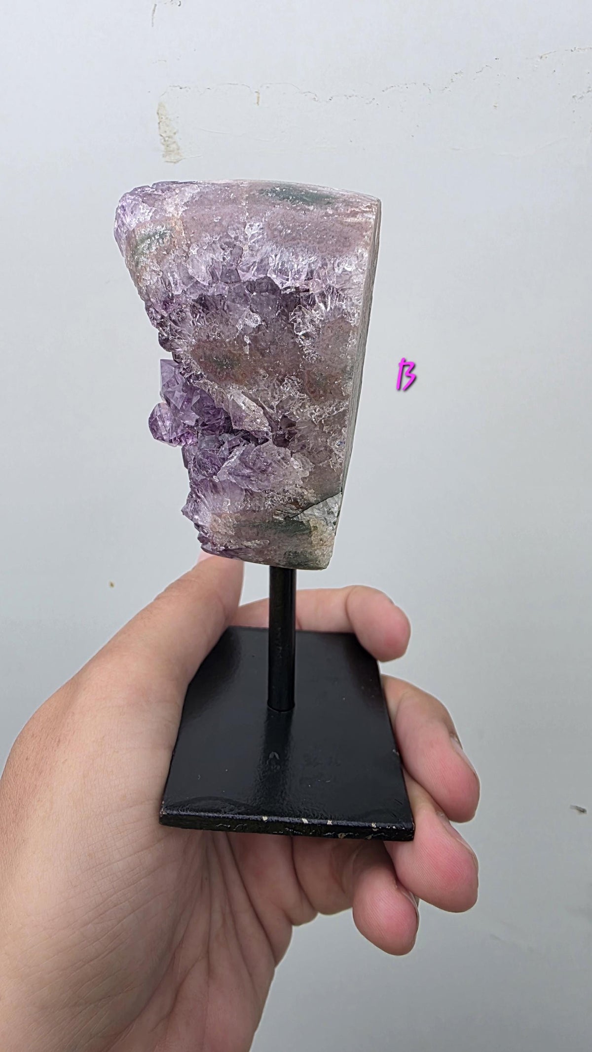 Natural Brazilian Amethyst on permanent stand
