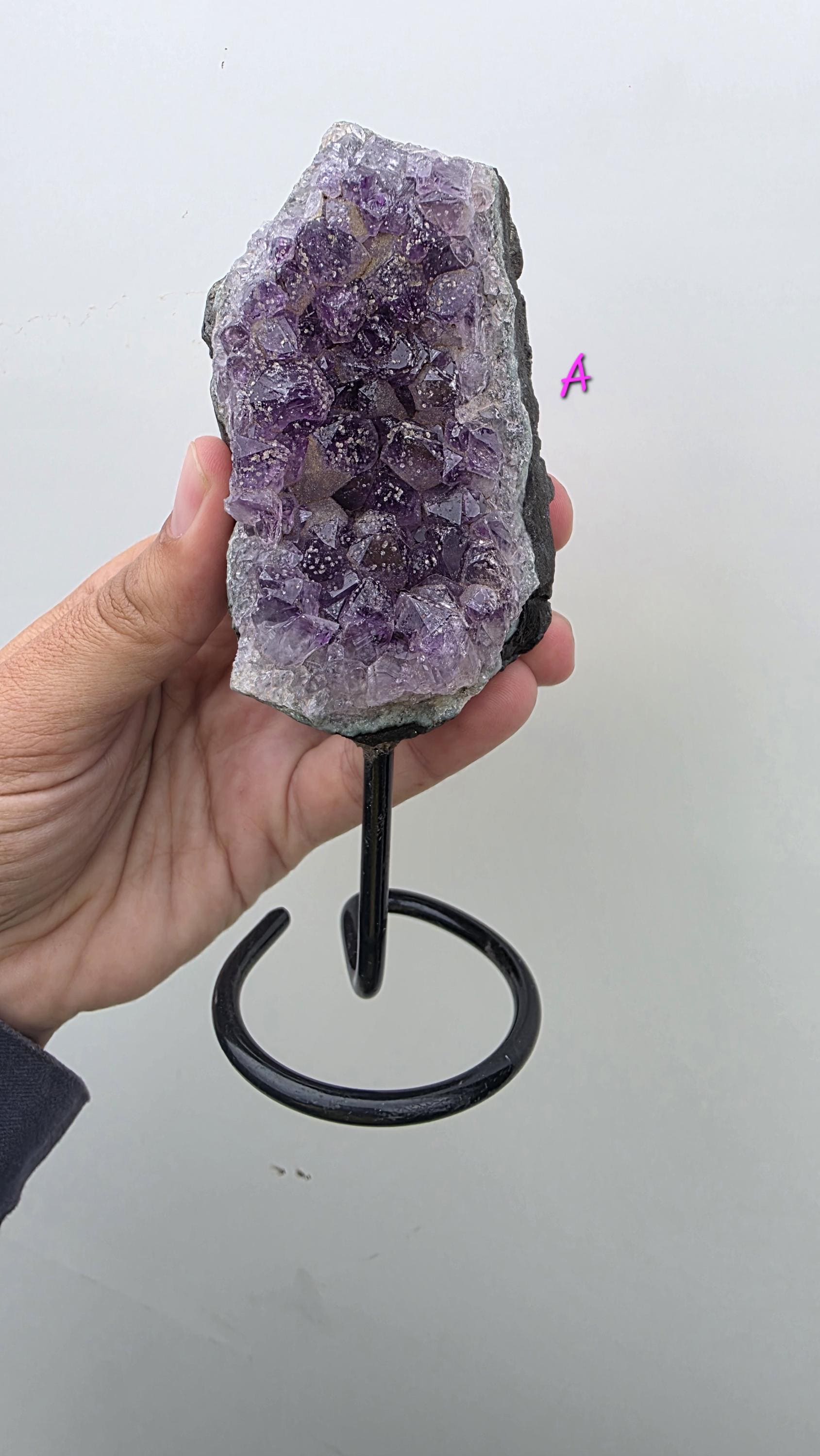 Natural Brazilian Amethyst on permanent stand
