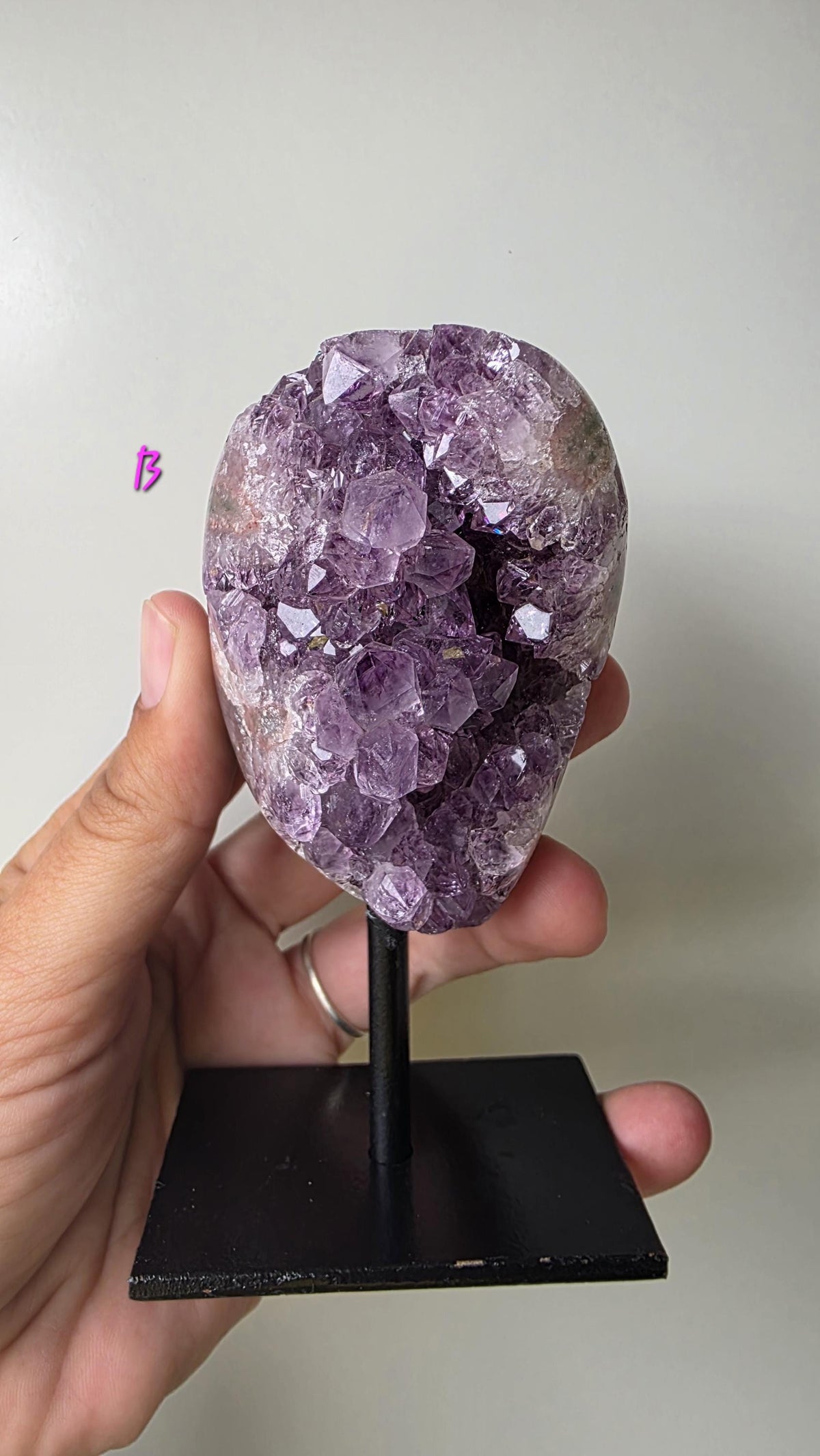 Natural Brazilian Amethyst on permanent stand