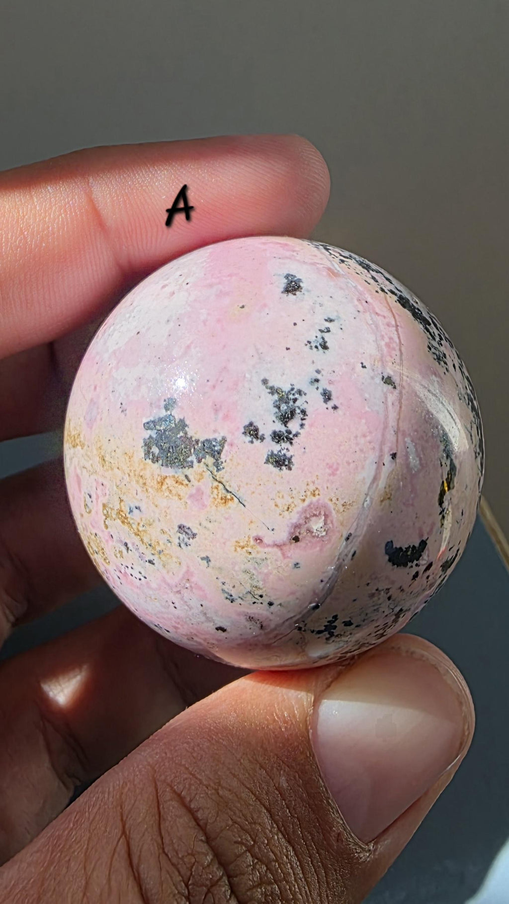 Puruvian Rhodonite Spheres