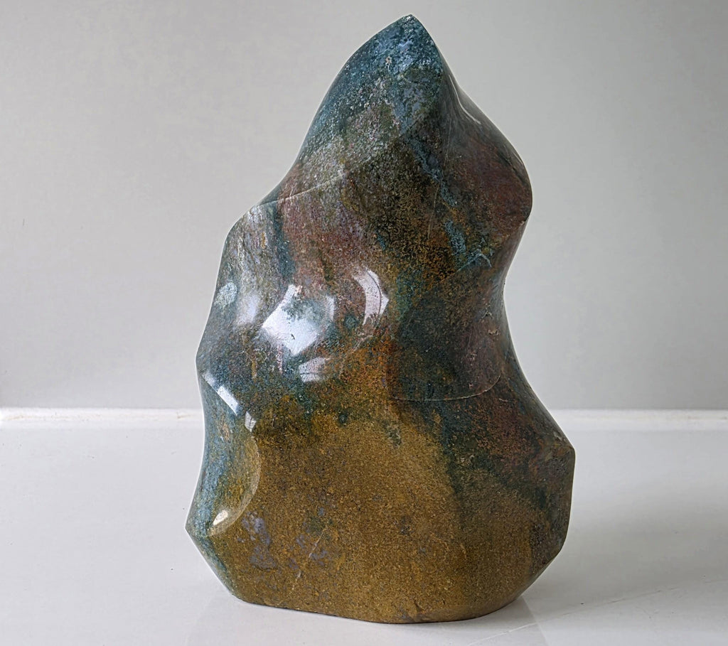 Polished Ocean Jasper Flame Crystal Carving – 428g (10cm)