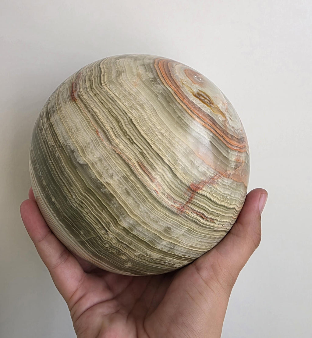 Extra large Banded calcite sphere ~ 5.08kgs