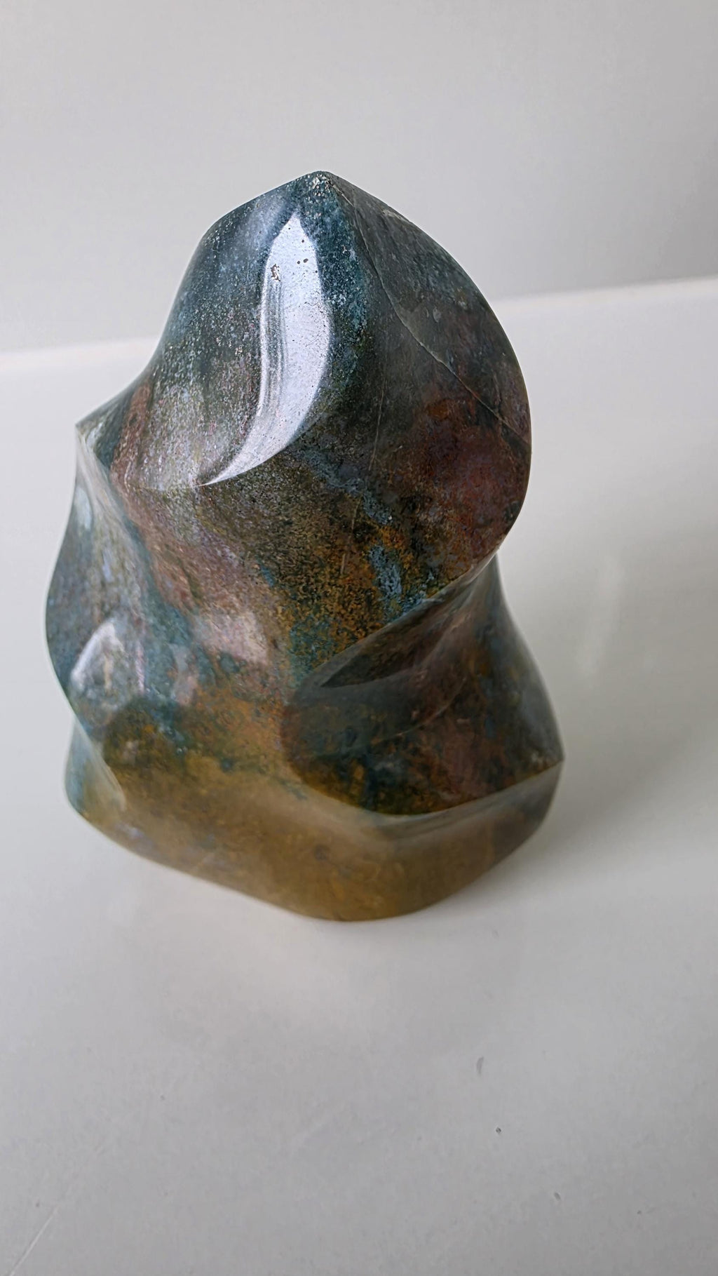 Polished Ocean Jasper Flame Crystal Carving – 428g (10cm)