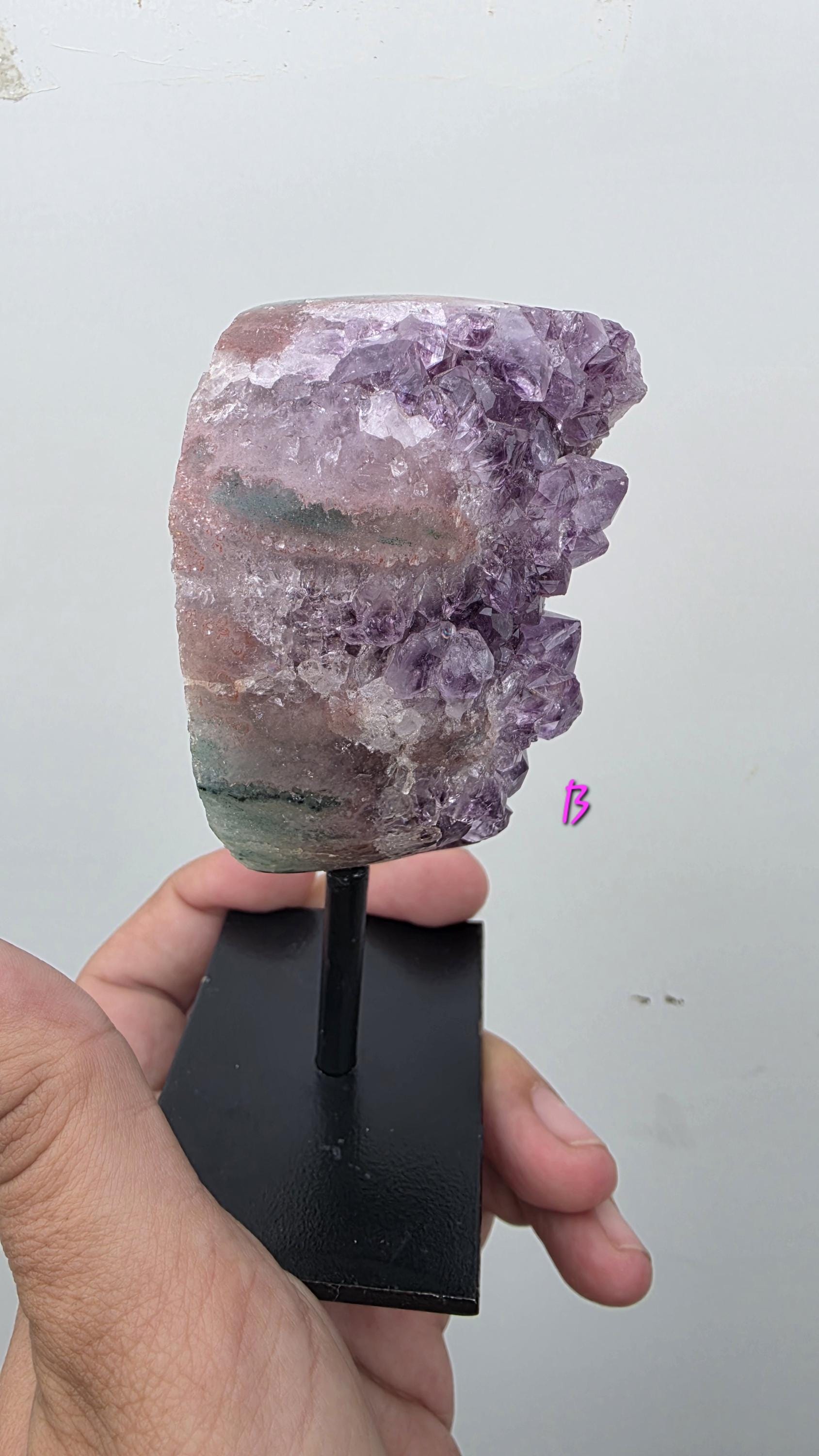 Natural Brazilian Amethyst on permanent stand