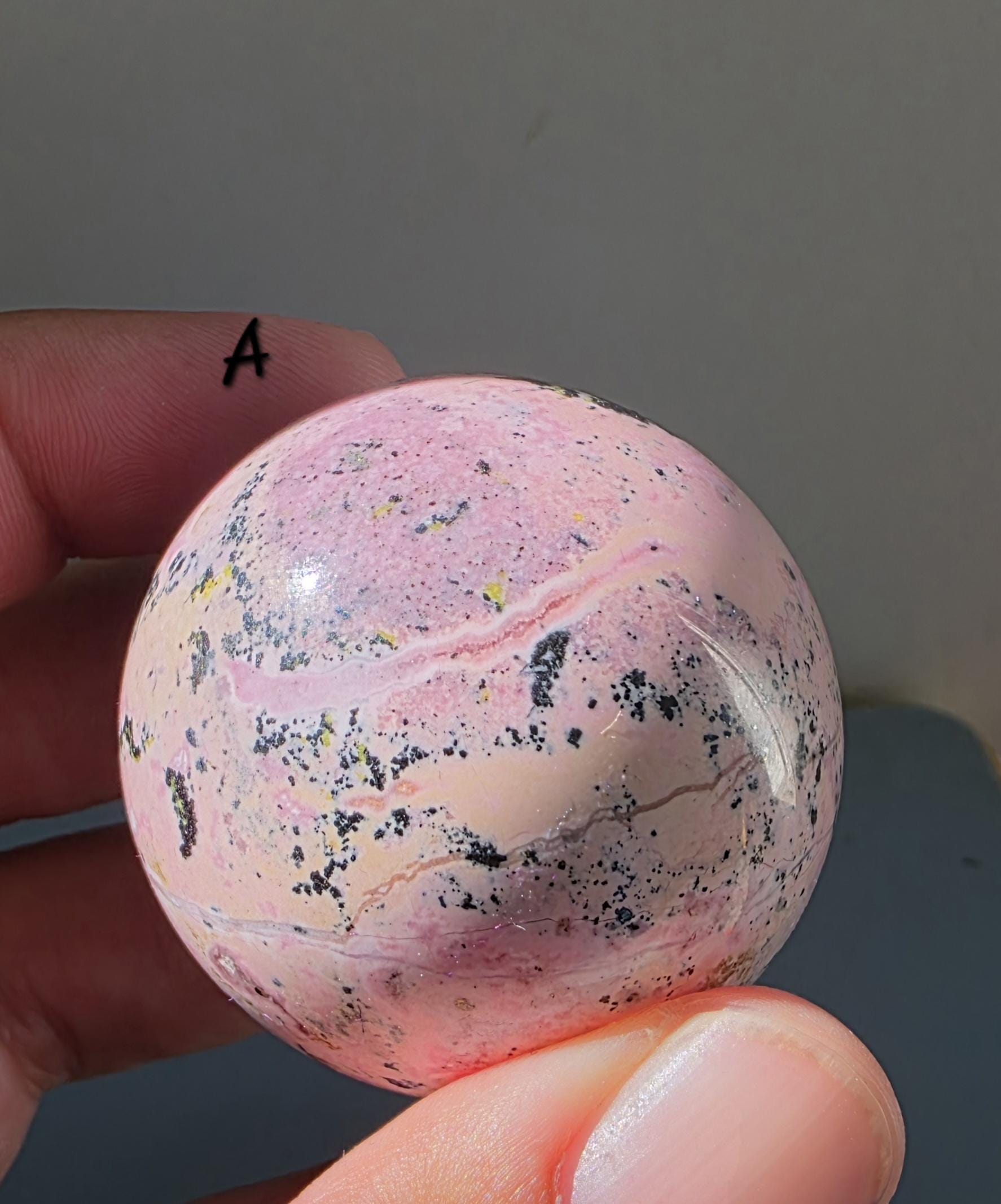 Puruvian Rhodonite Spheres