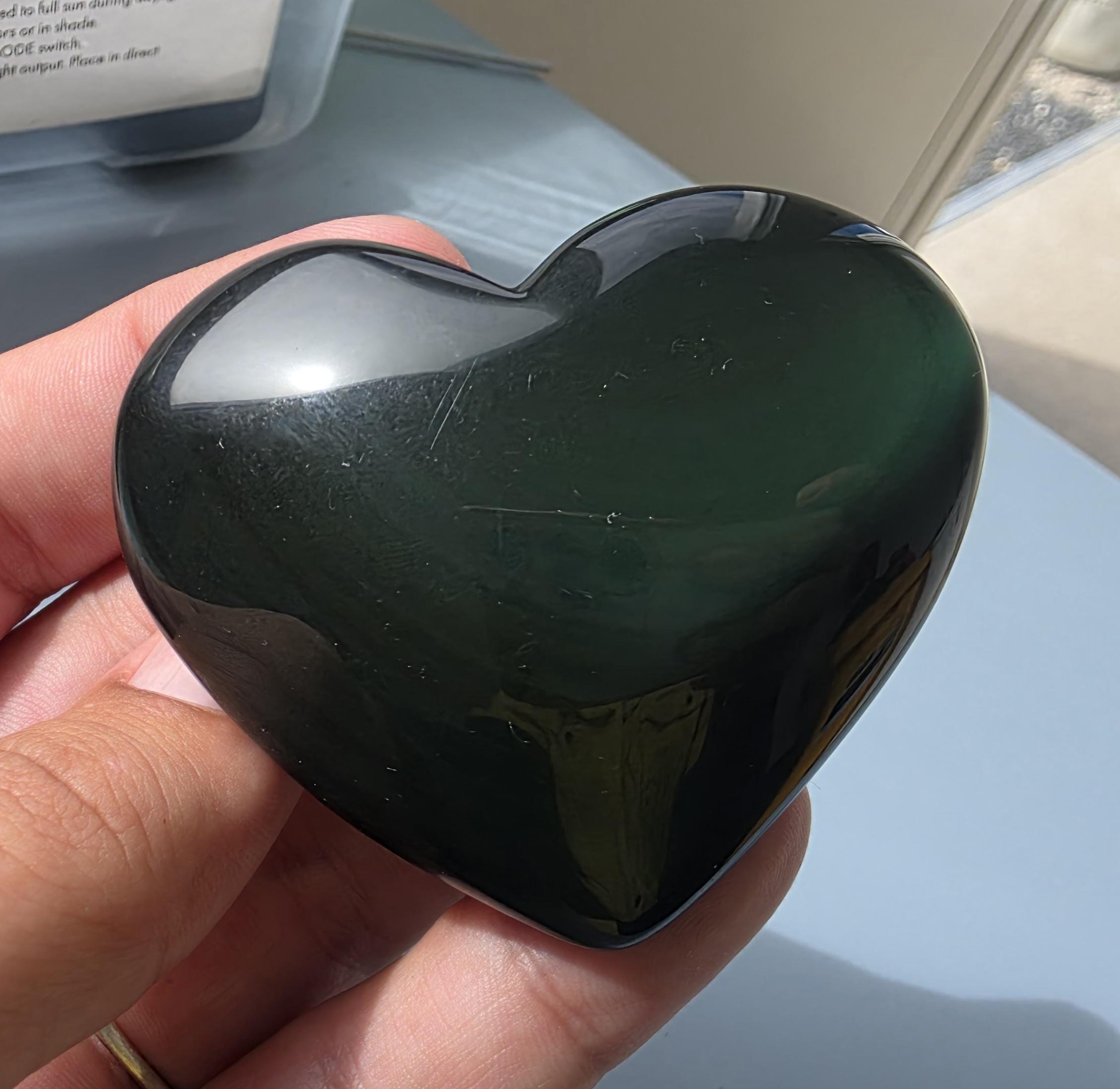 Polished green flash rainbow obsidian heart palm stone