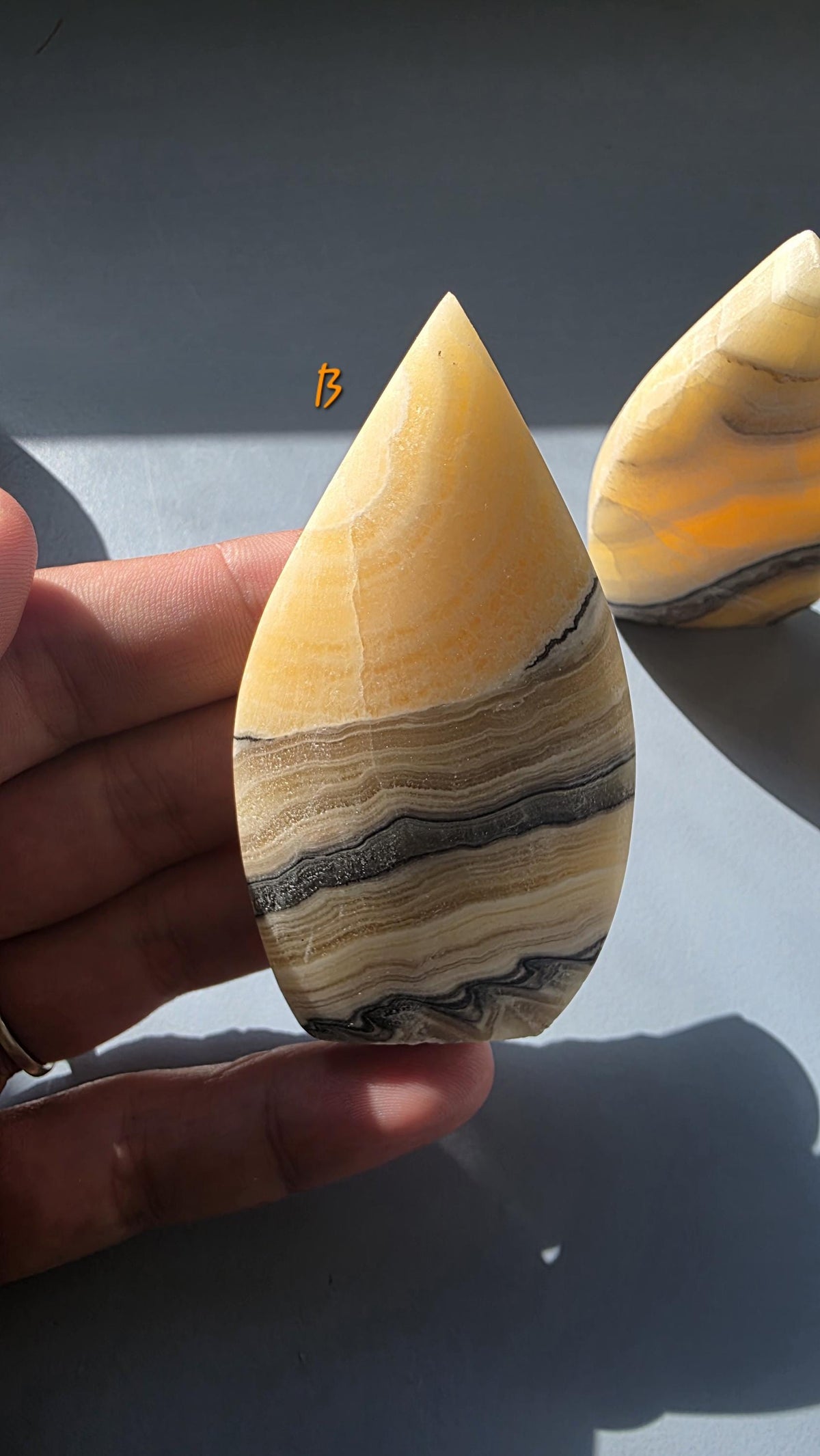 Banded Orange Calcite Tear-Drop Ornament, Matte Finish Mango Calcite Stone