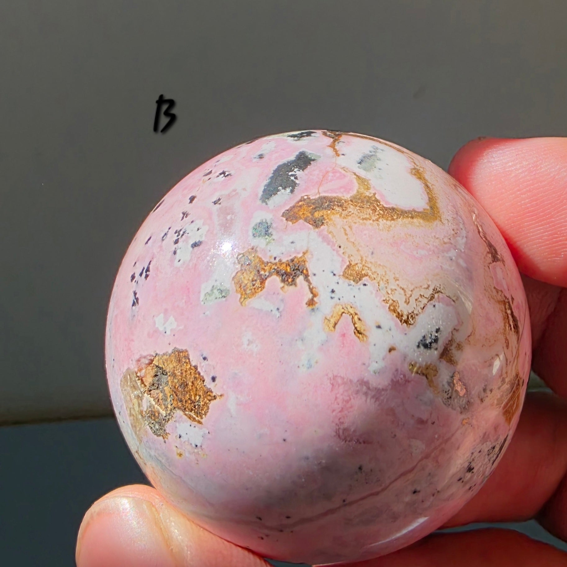 Puruvian Rhodonite Spheres