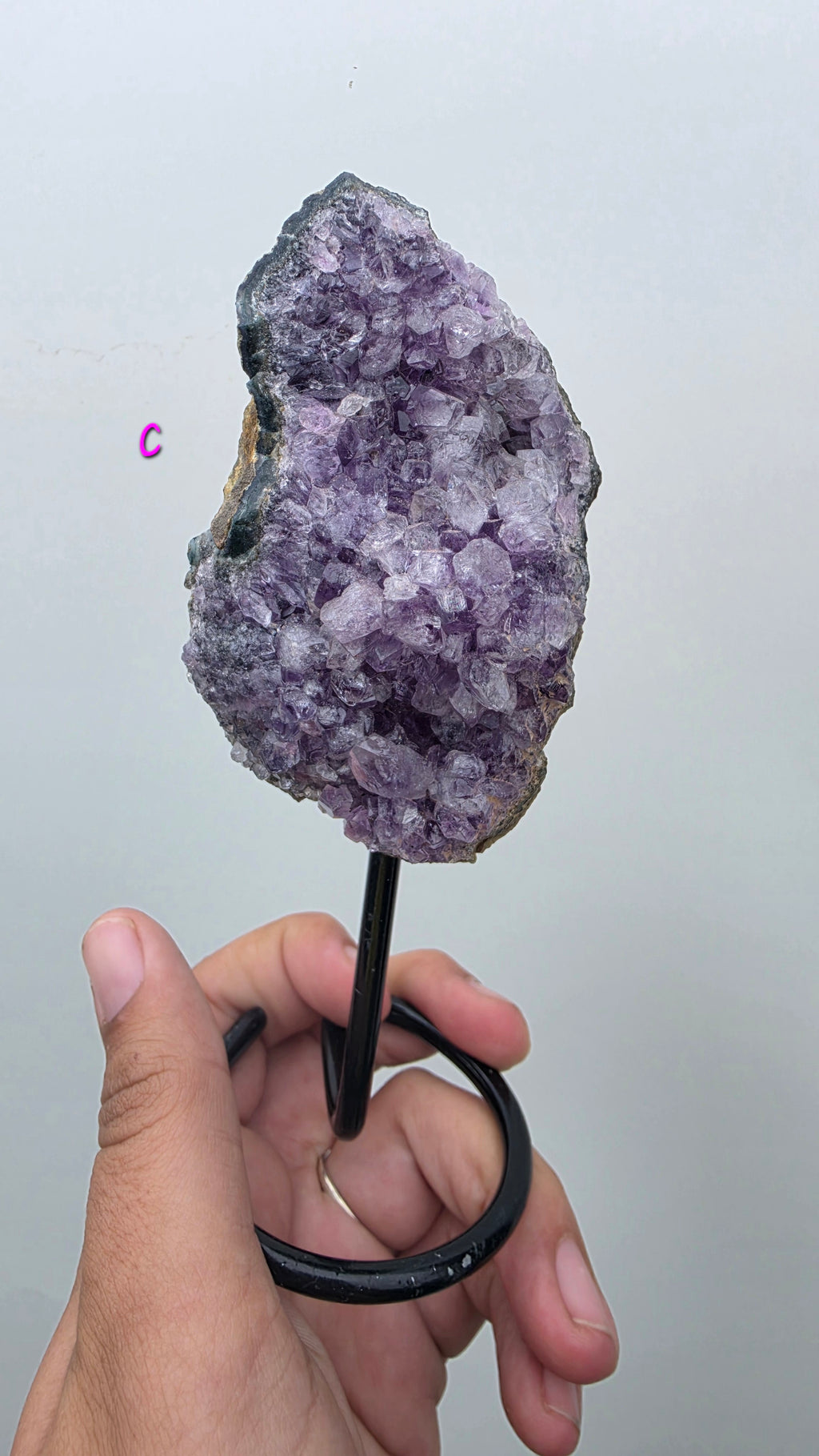 Natural Brazilian Amethyst on permanent stand