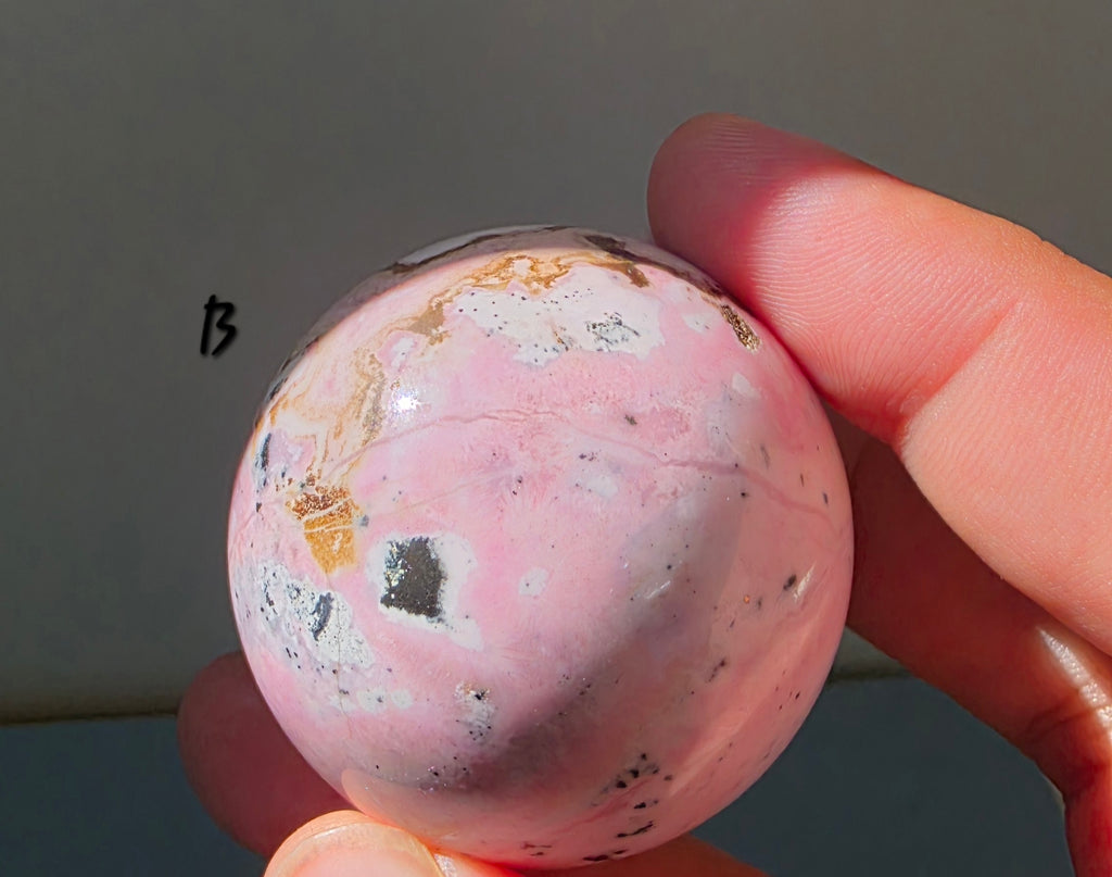 Puruvian Rhodonite Spheres