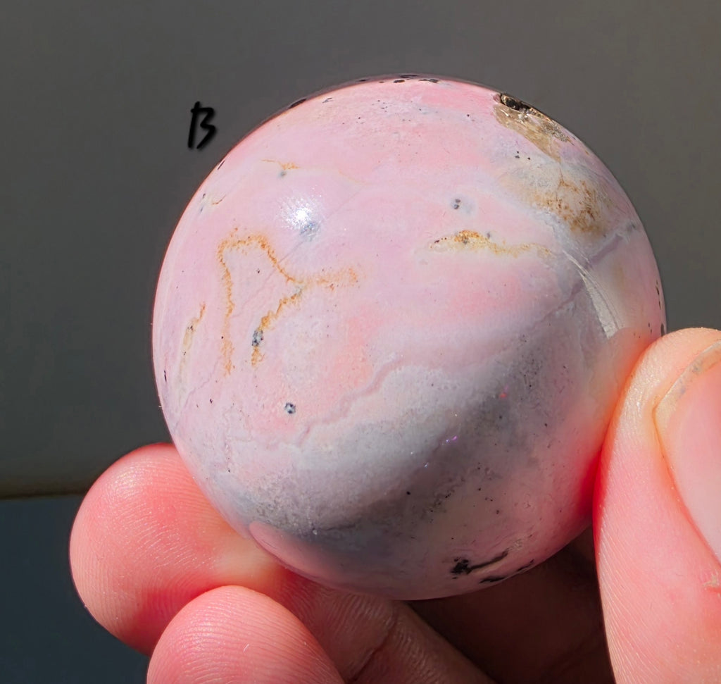 Puruvian Rhodonite Spheres