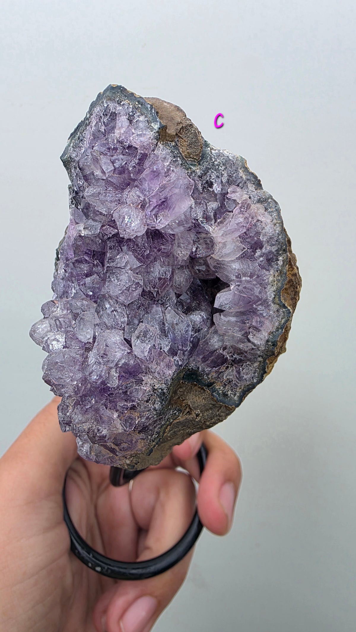 Natural Brazilian Amethyst on permanent stand